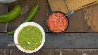 Selection of Middle Eastern dipping sauces including garlic, mint and chilli on a stone platter