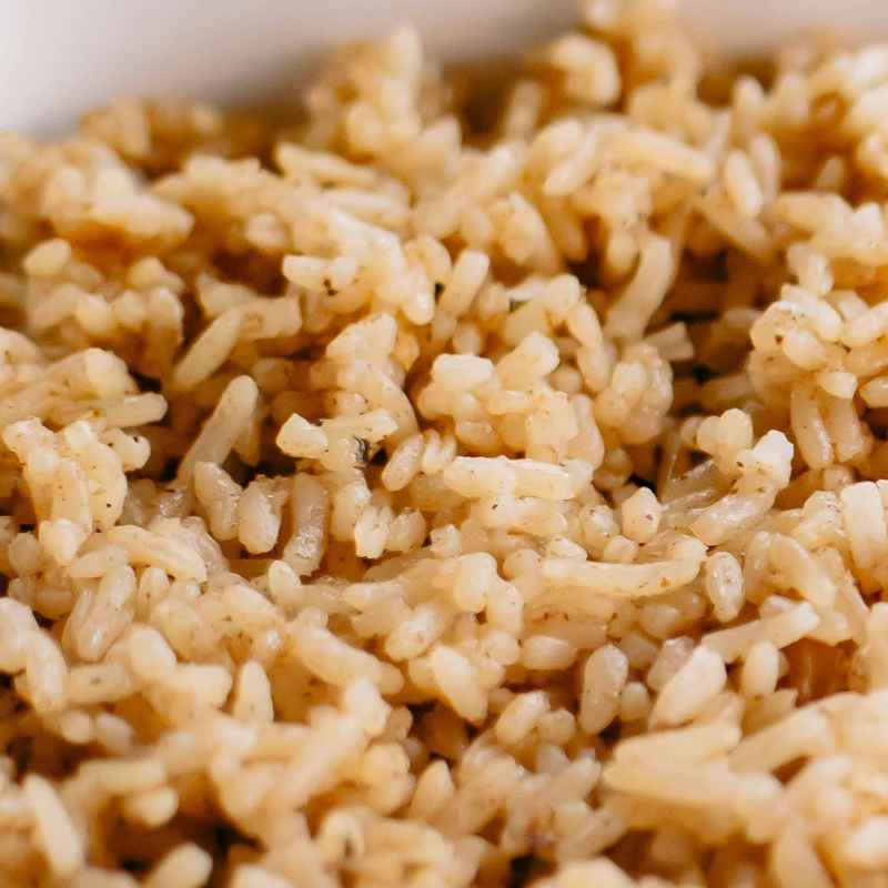 Bowl of fluffy seasoned rice with herbs