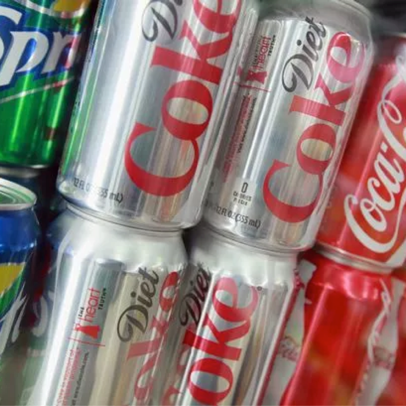 Assorted chilled soda cans arranged together